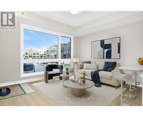 A modern living room with a view of the street outside.