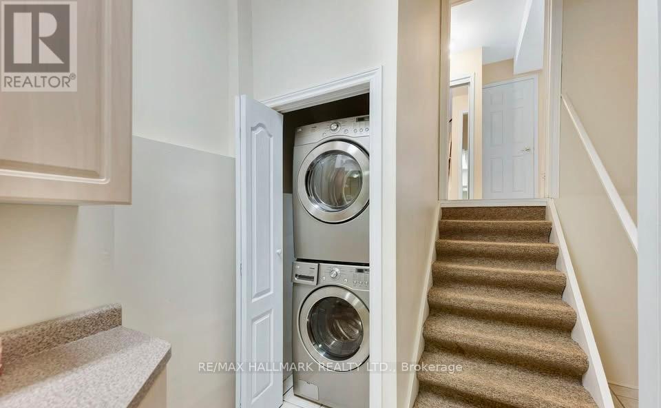 A washing machine is built into a wall in a home.