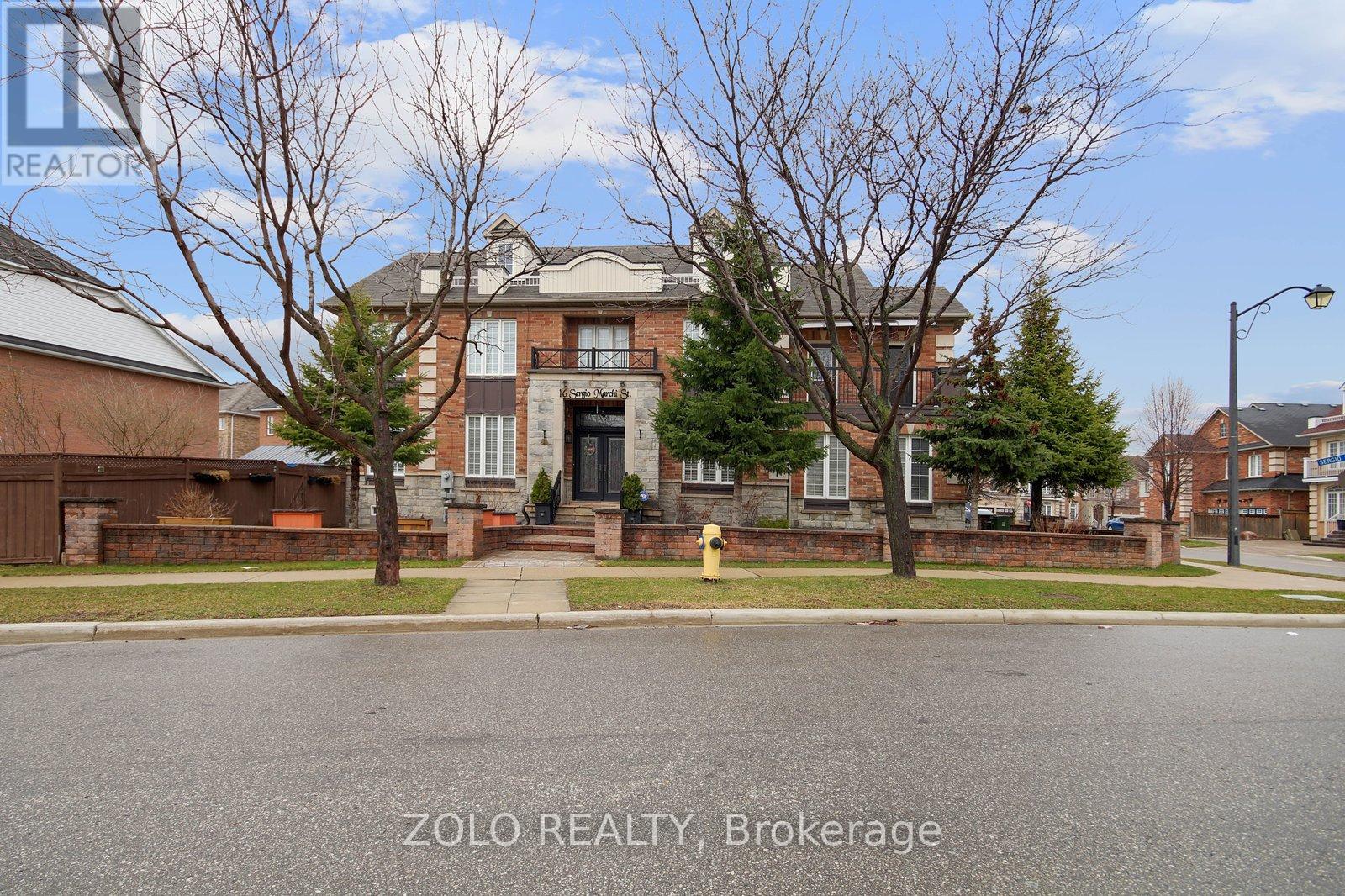 A house with a tree in front of it.