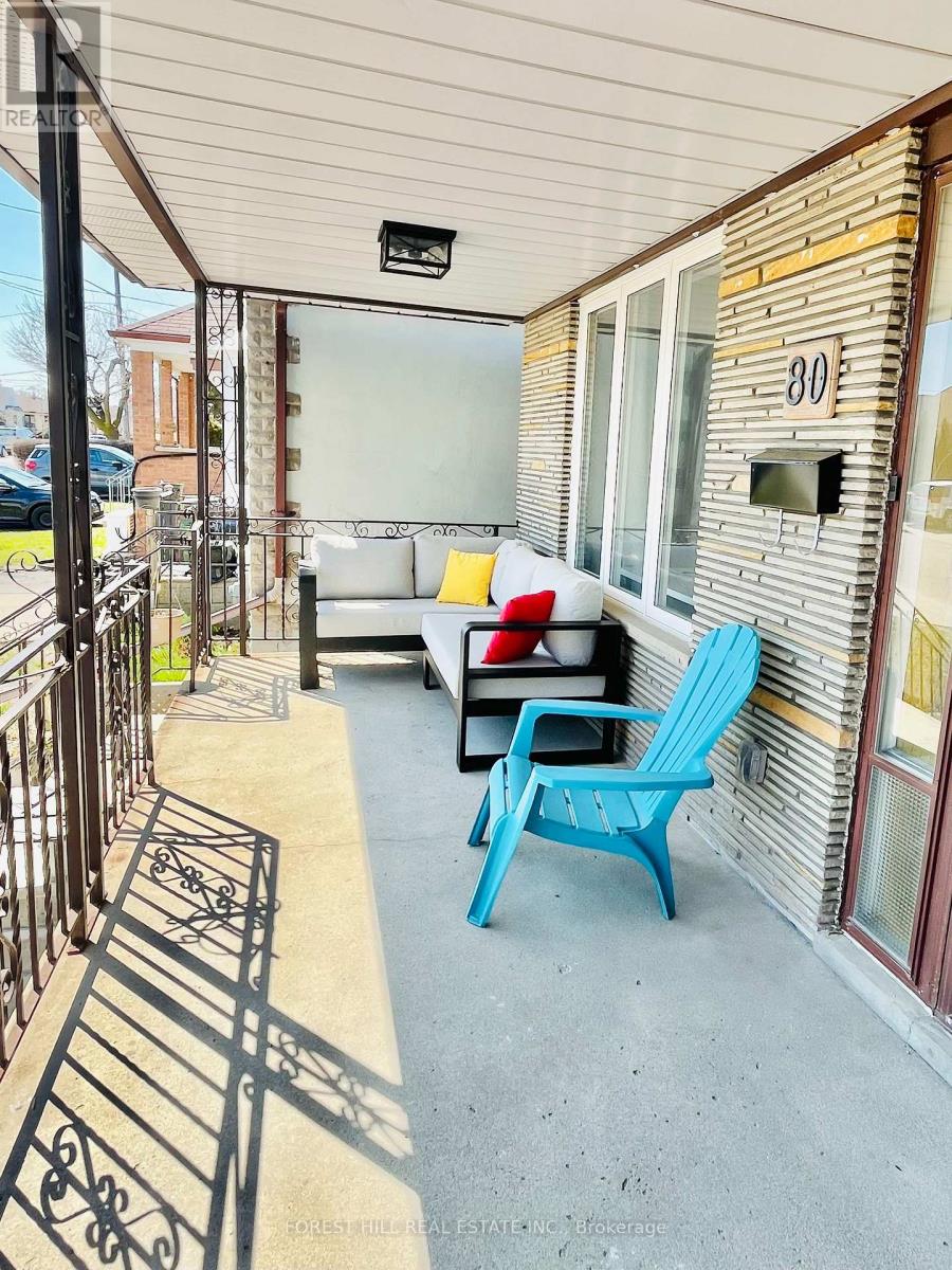 A blue chair is on a patio.