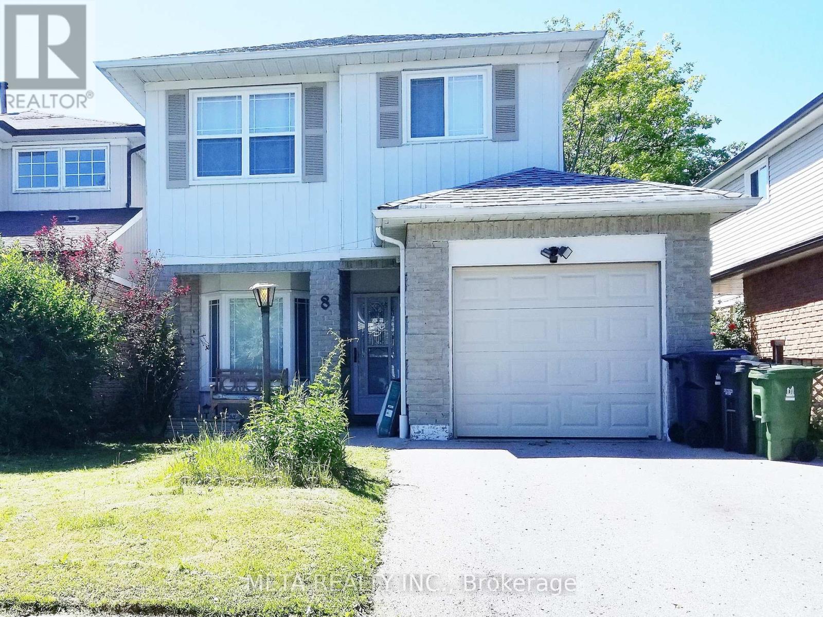 A two-story house with a garage is for sale in Raleigh, North Carolina.