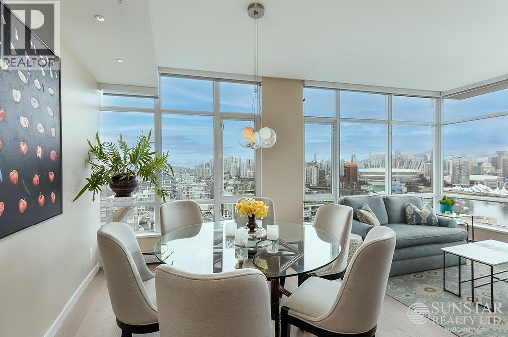 A dining room with a view of the city.