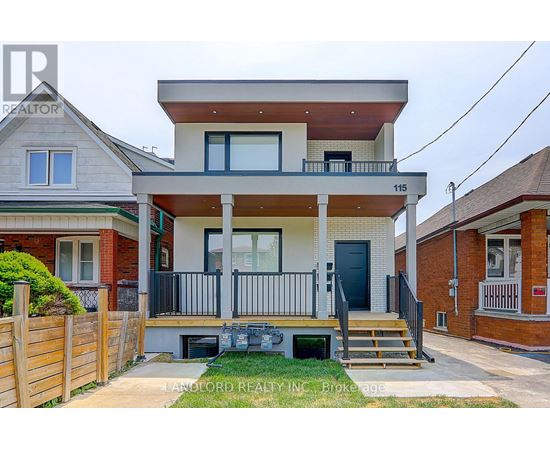A two-story house with a balcony and a black door is for sale.