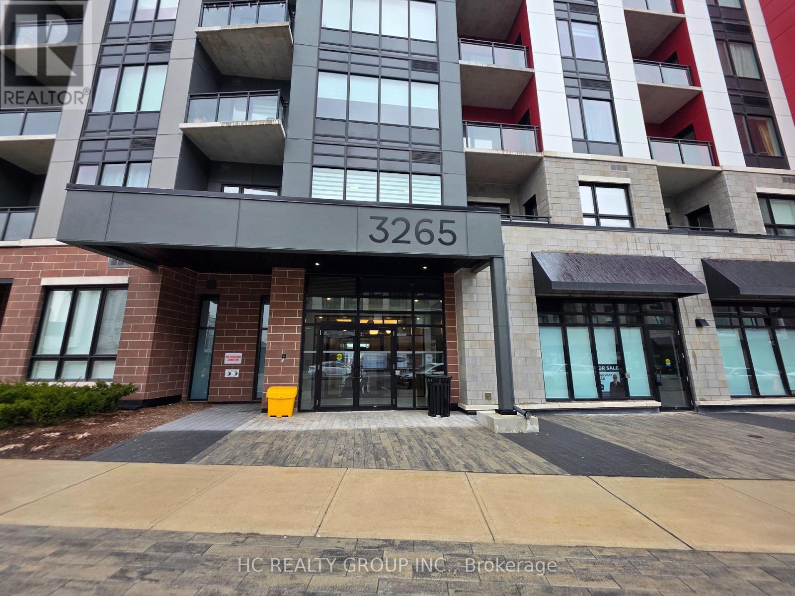 The front of a building with the number 3265 on it.