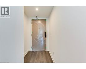 A room with a door covered in plastic wrap.