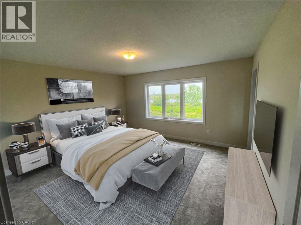 A bedroom with a large bed and a flat screen TV mounted on the wall.