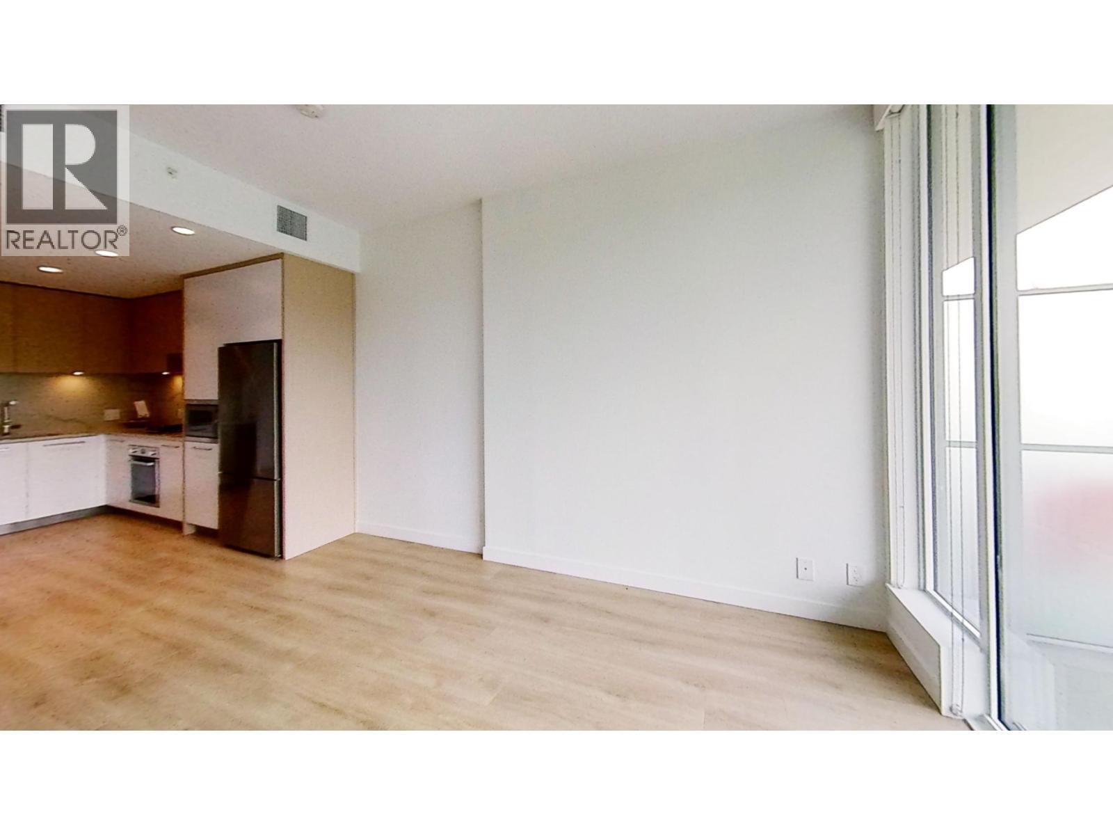 A realtor logo is on the top left corner of the image.