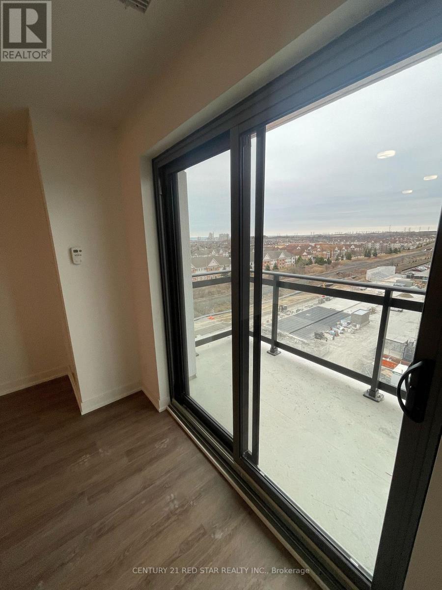 A view from a window in a room with Century 21 Red Star Realty Inc. written on the bottom.