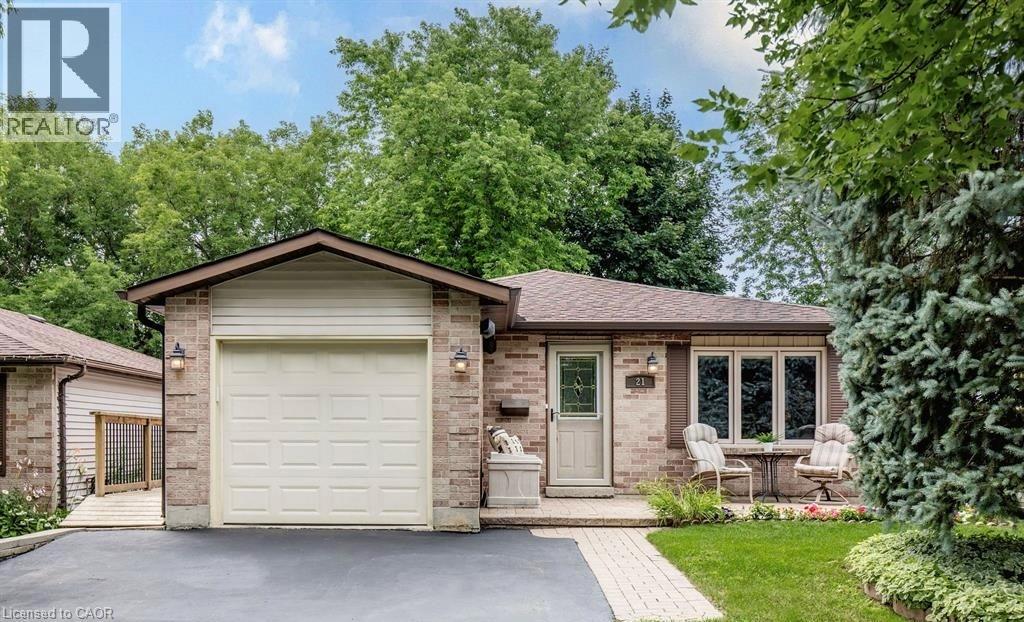 A house with a garage is for sale.