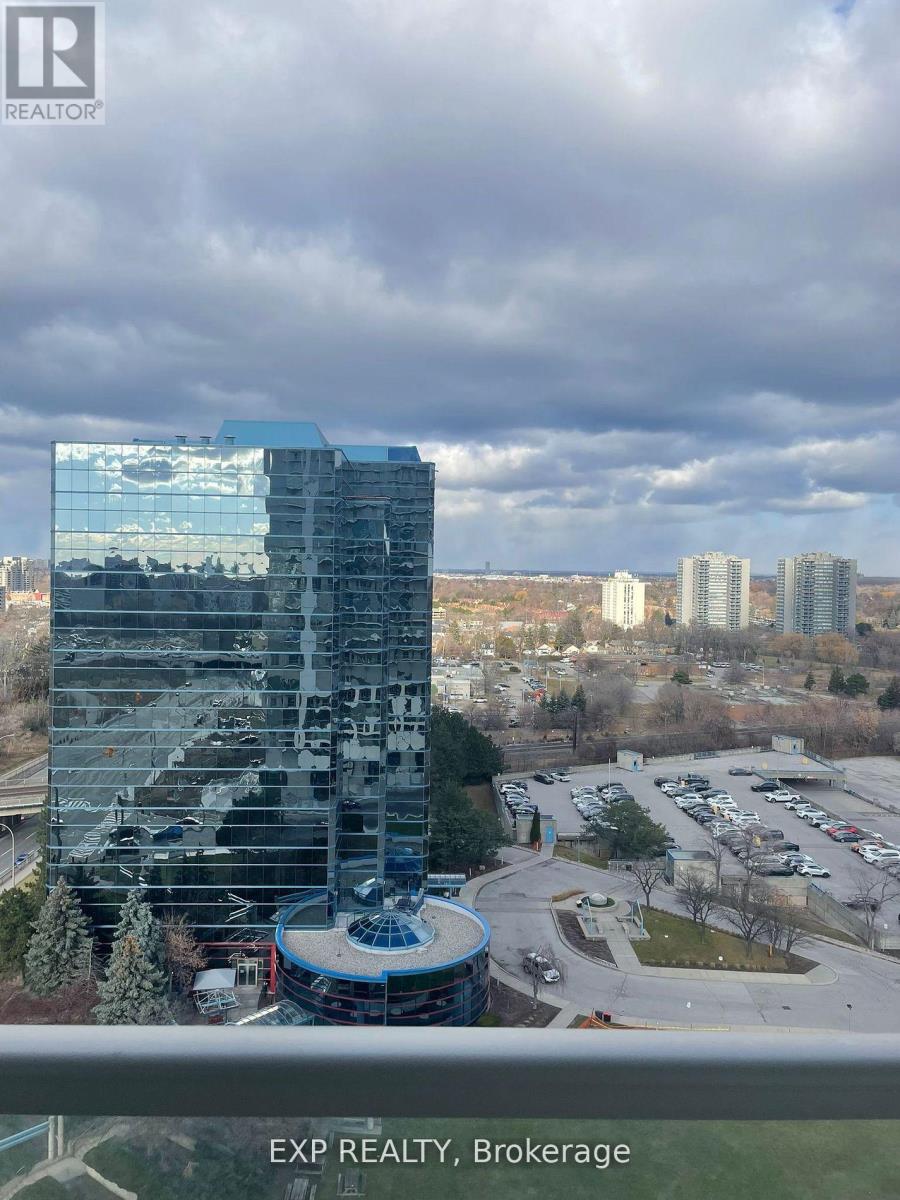 A tall building with a glass facade dominates the skyline in this image.
