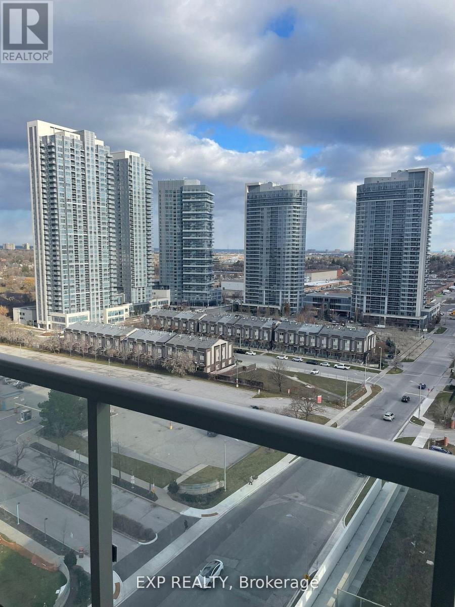 A view of a cityscape from a balcony with the text "EXP REALTY, Brokerage" visible on the railing.