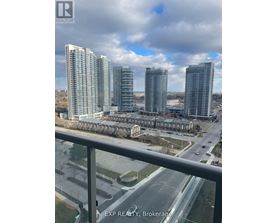 A view of a cityscape from a balcony with the text "EXP REALTY, Brokerage" visible on the railing.