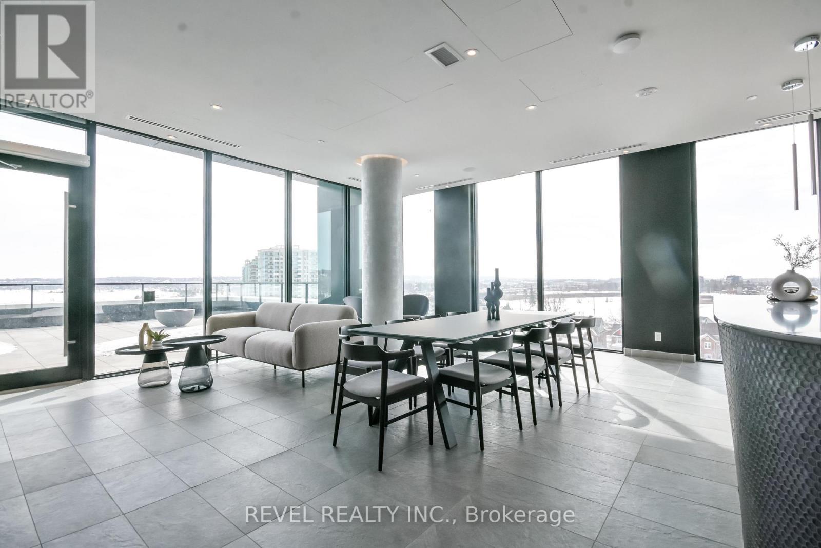 A modern dining room with a table set for six.