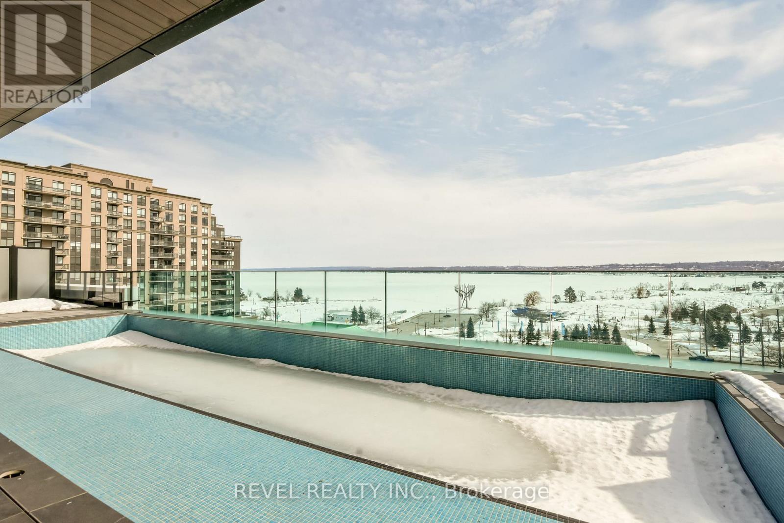 A pool surrounded by snow.
