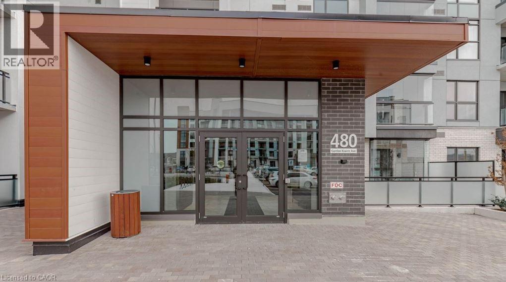 The front of a building with a glass door and a sign that reads "REALTOR".