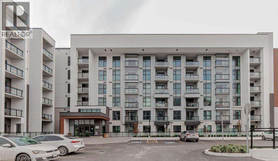 A large building with a sign that says REALTOR in front of it.
