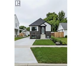 A house with a black front door and a small porch.