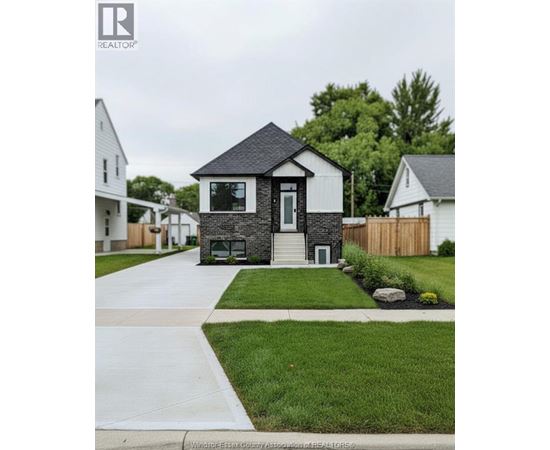 A house with a black front door and a small porch.