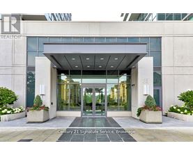 The front of a building with a glass door entrance and a sign that says Century 21 Signature Service, Brokerage.