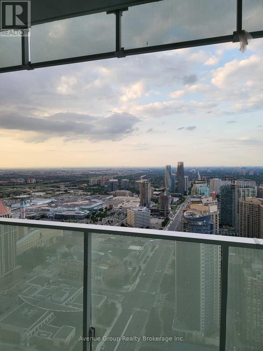 A view from a high-rise building looking out over a cityscape.