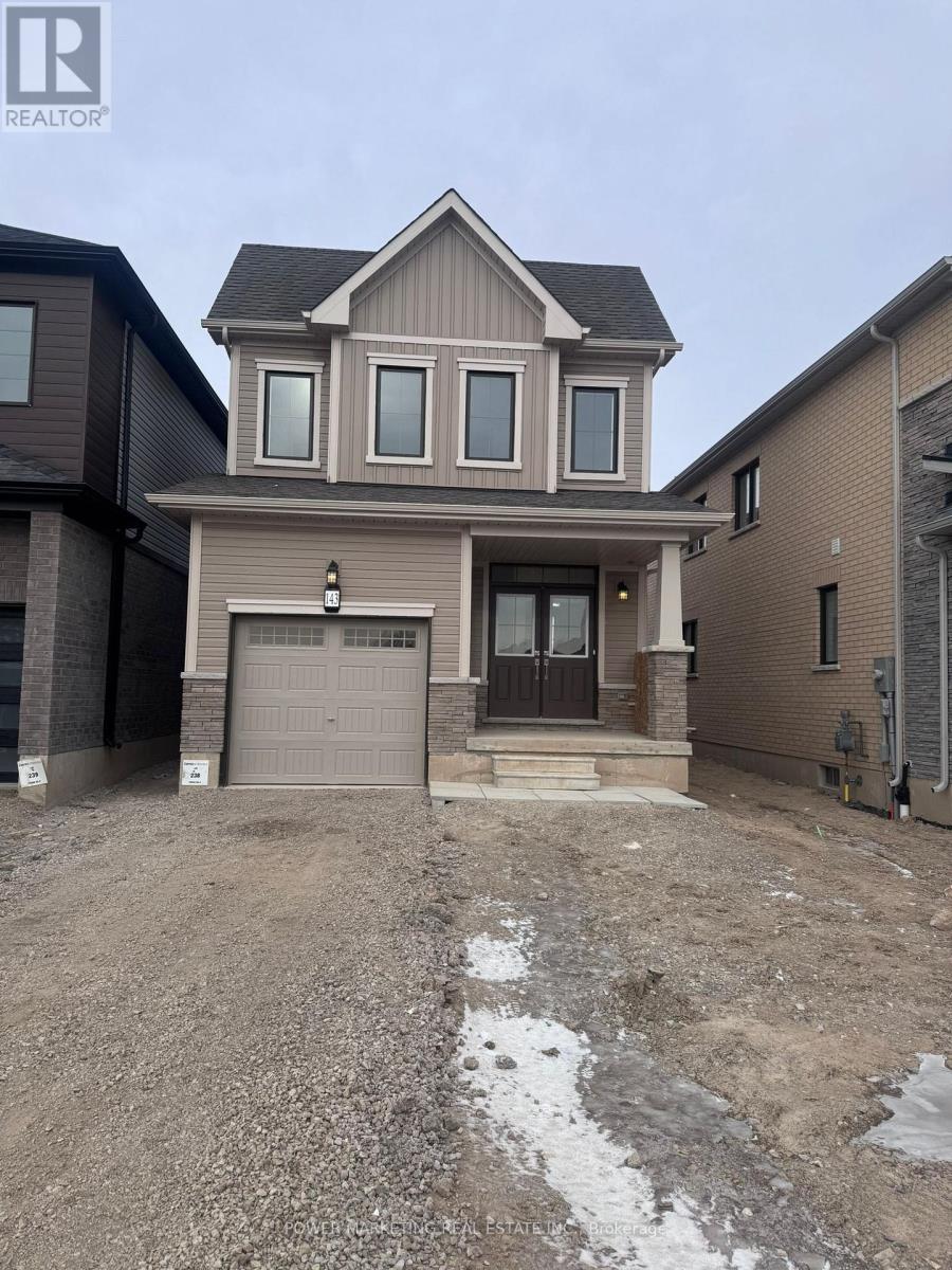 A house with a garage is for sale.
