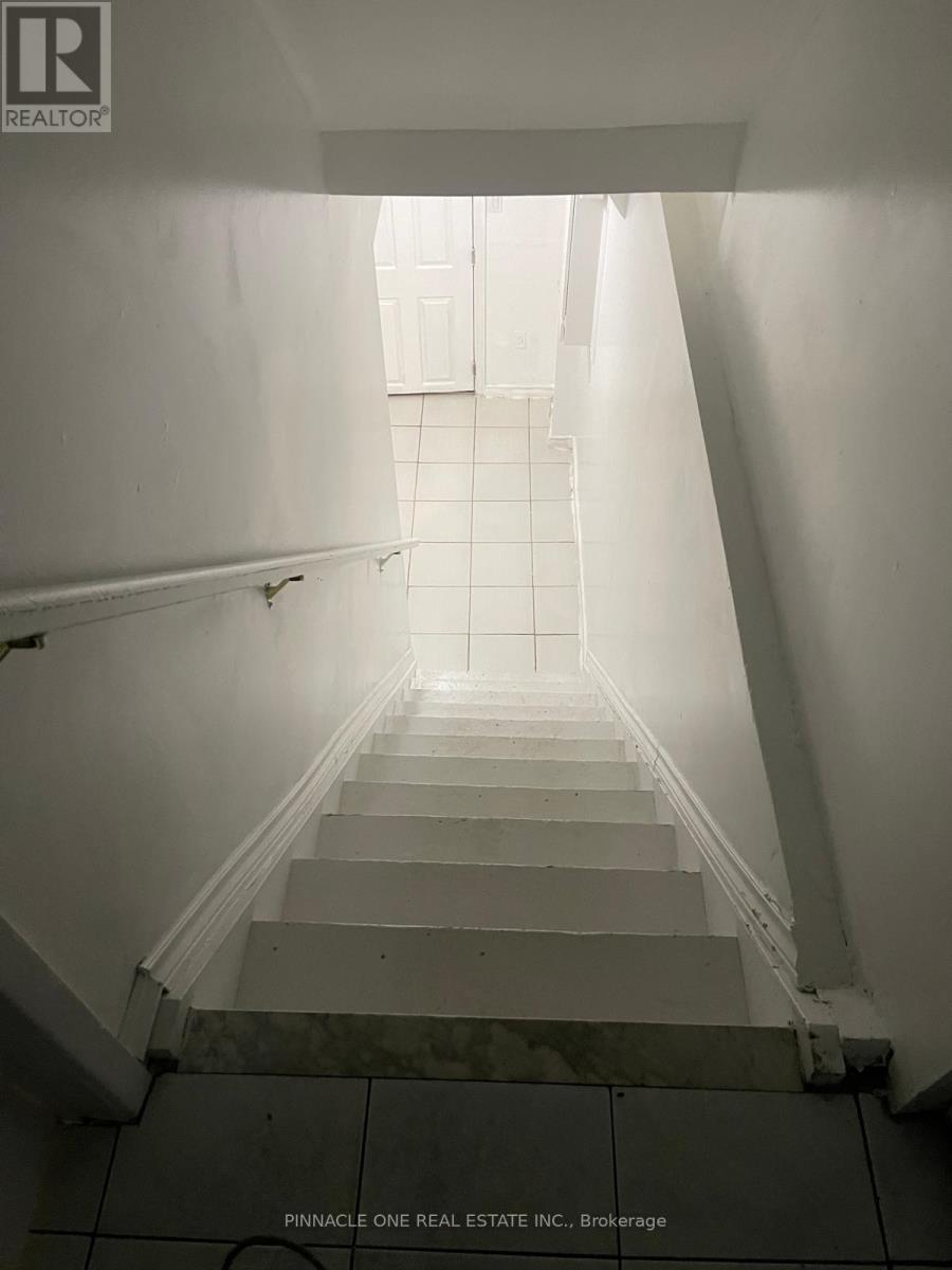 A staircase leading to a bright light at the top.
