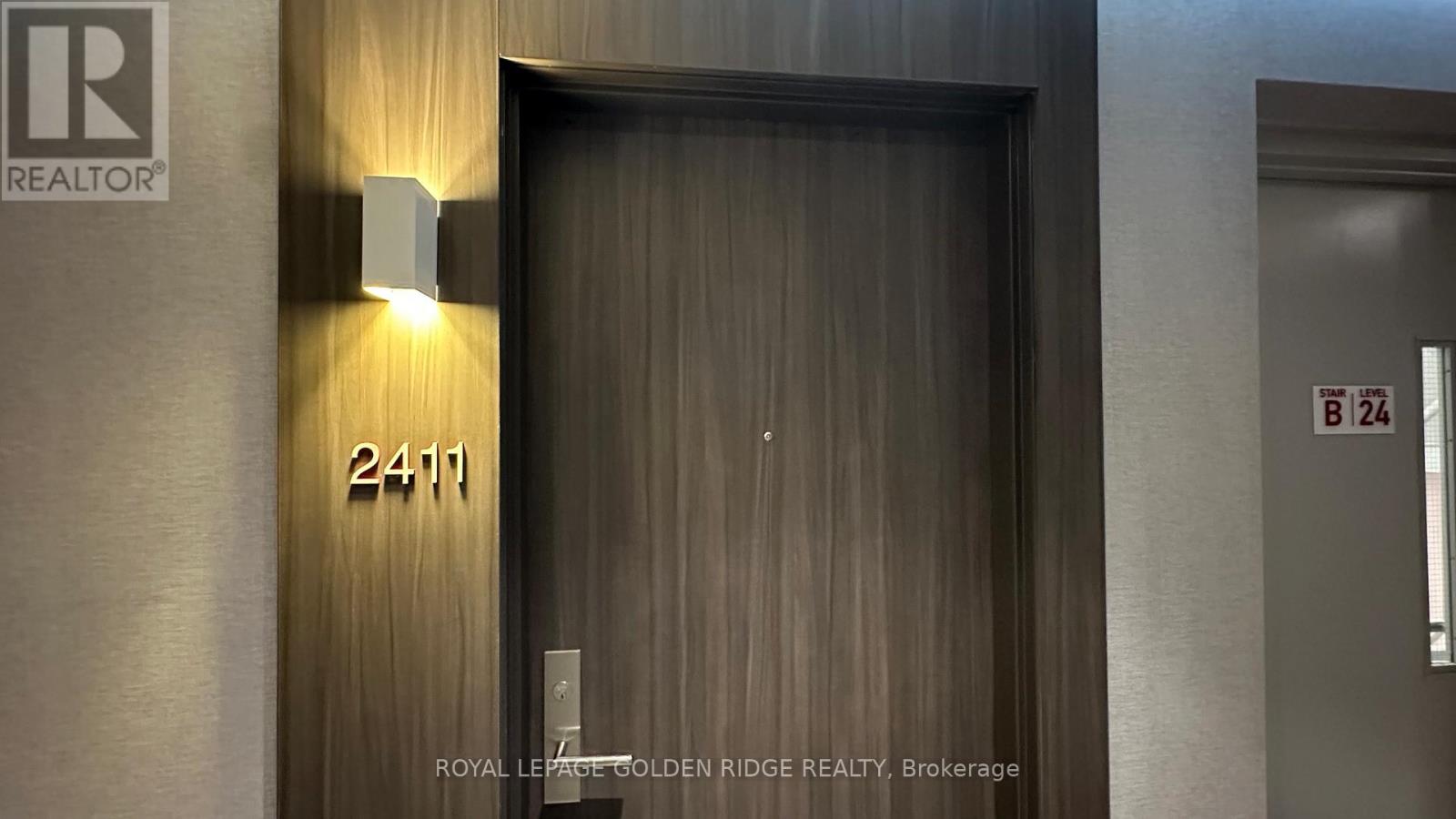 A door with the number 2411 on it.