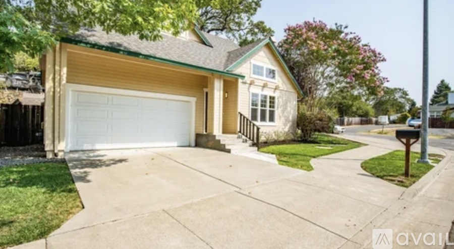 A two-car garage is attached to a house.