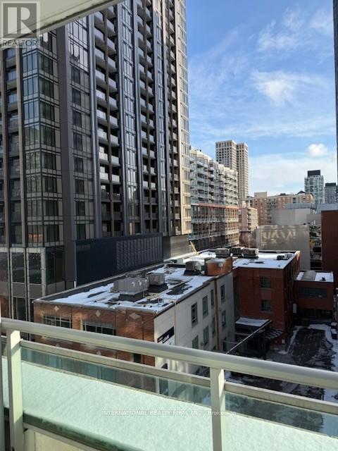 A view of a cityscape from a high-rise building.