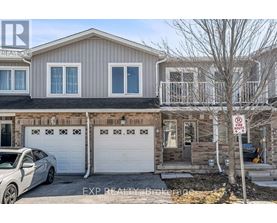 A two-story house with a garage and a car parked in front.