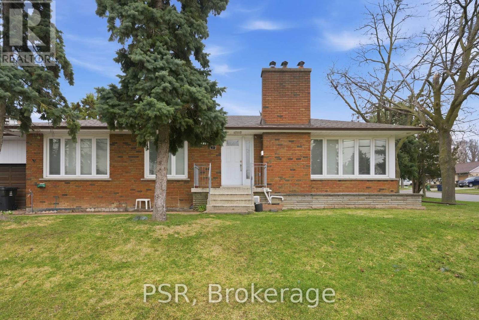 A house with a white door and windows is for sale in Brokerage.