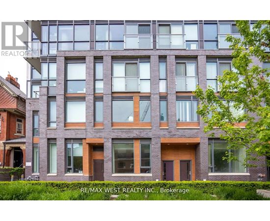 A modern building with a glass facade is shown with the RE/MAX West Realty logo in the corner.