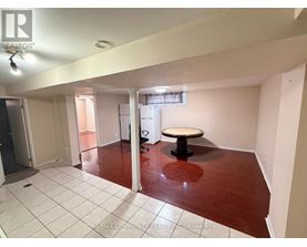 A room with a table in the middle of the room.