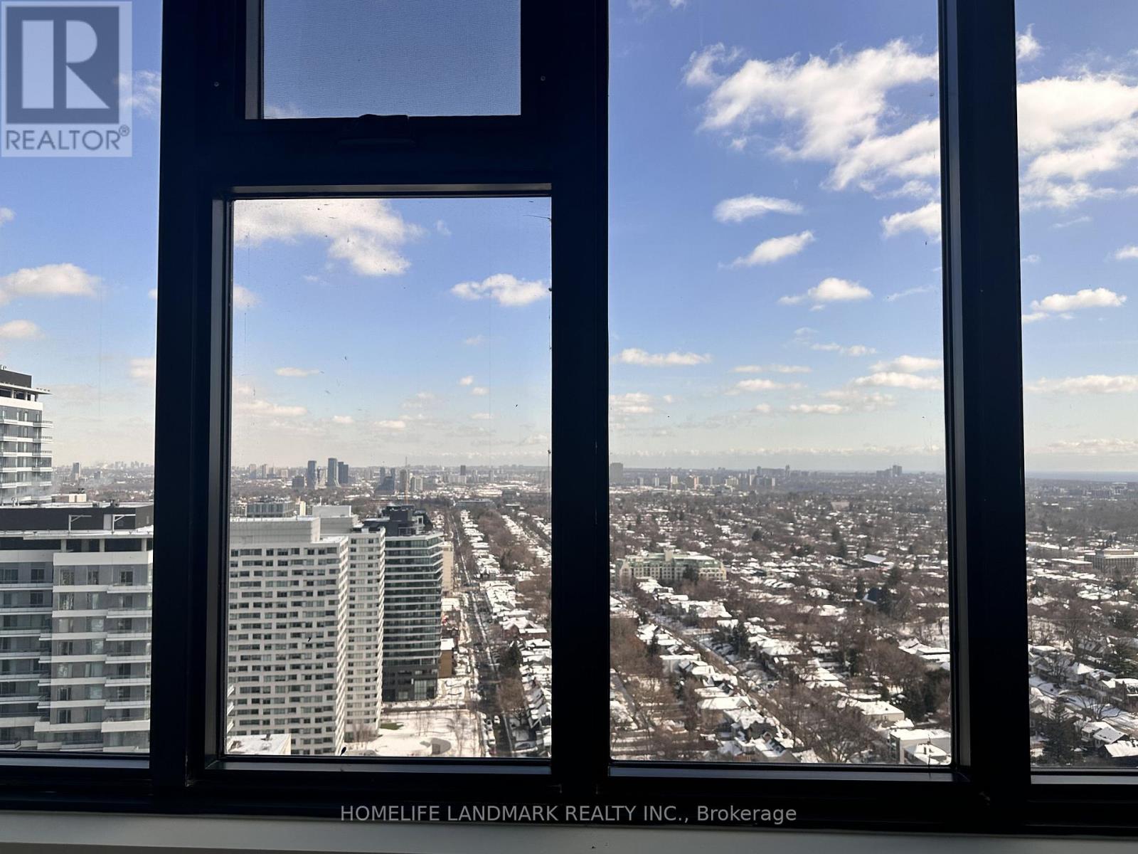 A view of a city from a high-rise building.