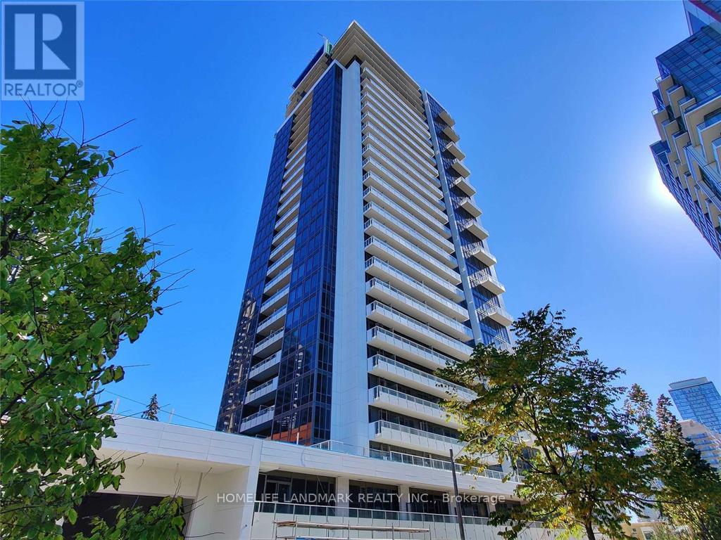 A tall building with a sign that reads "HOMELAND REALTY INC." is seen in the foreground with trees and other buildings in the background.