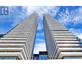 Two tall buildings with the logo REALTOR on the bottom.
