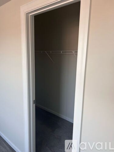 A white door with a glass window in the middle.