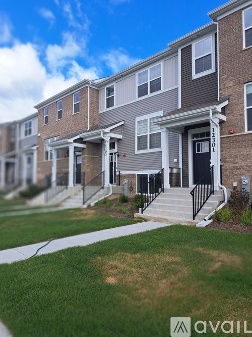 A row of houses with the number 12201 on the front door.