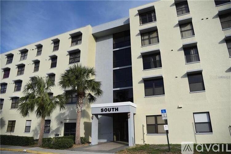 A building with a sign that says South on it.