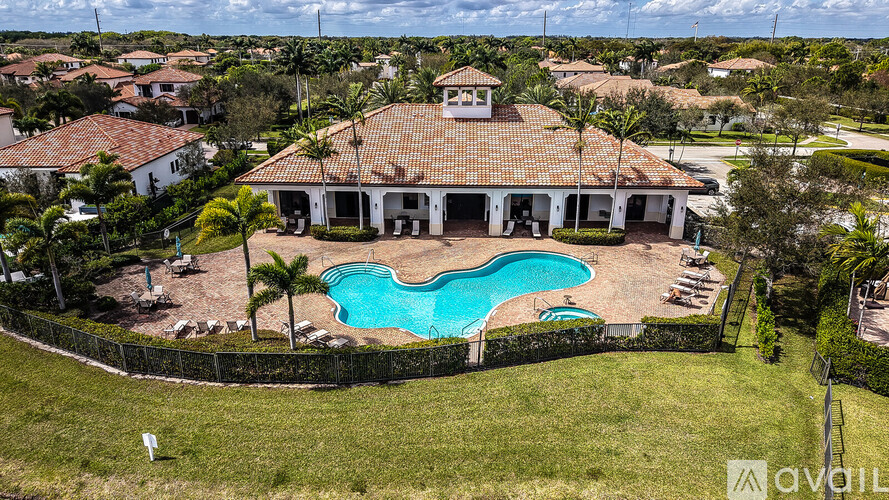 A large house with a pool in the backyard.