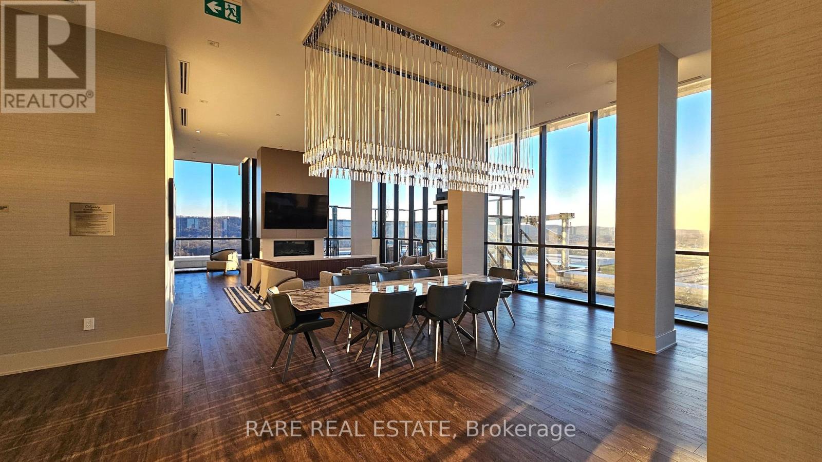 A modern dining room with a large table and chairs is on the market.