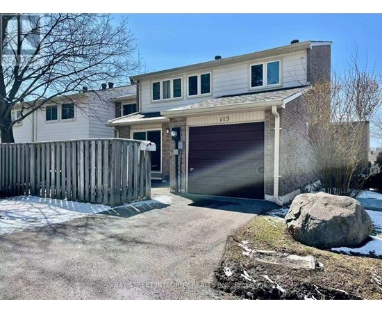 A two-story house with a garage and a driveway.