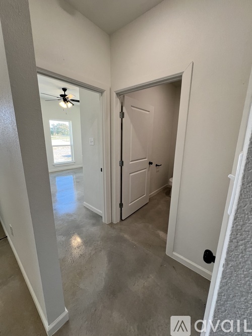 A room with a door and a window.