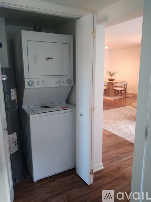 A white oven and dishwasher in a kitchen.