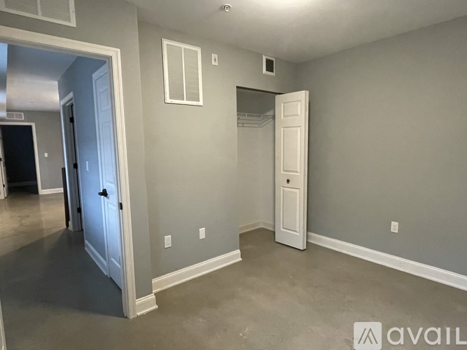 A room with a door and a window.