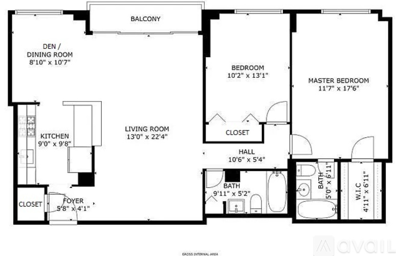 A floor plan of a house with a balcony, two bedrooms, a living room, a dining room, a kitchen, a foyer, and a closet.