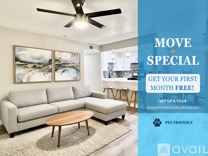 A living room with a couch, a coffee table, and a ceiling fan, with an advertisement for a free first month offer.