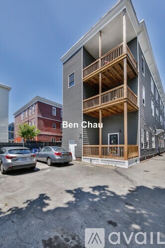 A modern two-story building with a balcony and the name "Ben Chau" on the front.
