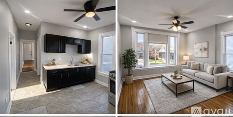 A modern kitchen and living room with a ceiling fan.