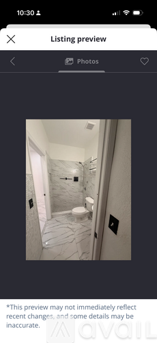 A bathroom with a toilet and a sink.